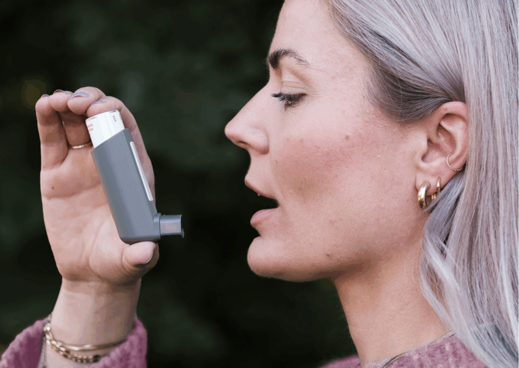 woman using asthma pump, long term health conditions and COPD related